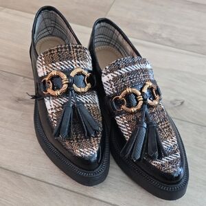 Circus by Sam Edelman Black and Brown Flats with Tassel Detail